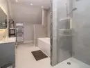 Family bathroom at Langley Barn - thumbnail photo