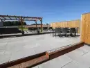 Patio area at Langley Barn - thumbnail photo