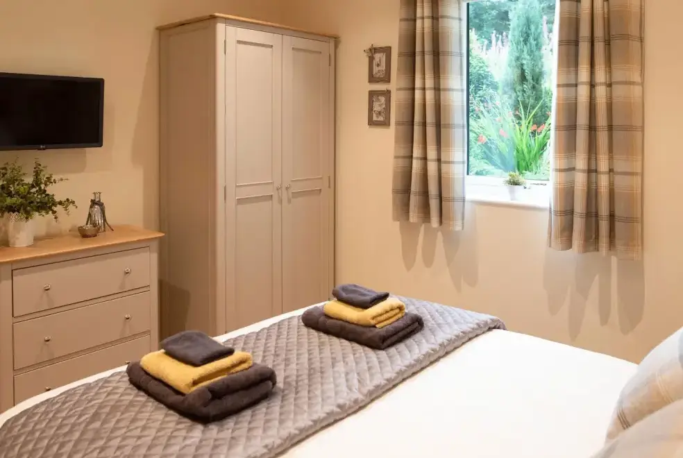 Bedroom at Larchwood Lodge