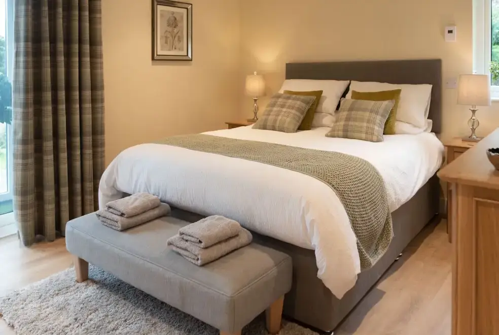 Bedroom at Larchwood Lodge