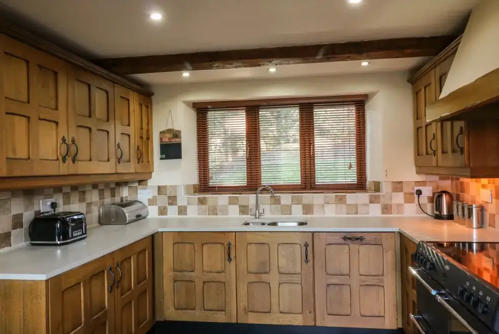 Farmhouse style kitchen at Linhay Barn Conversion