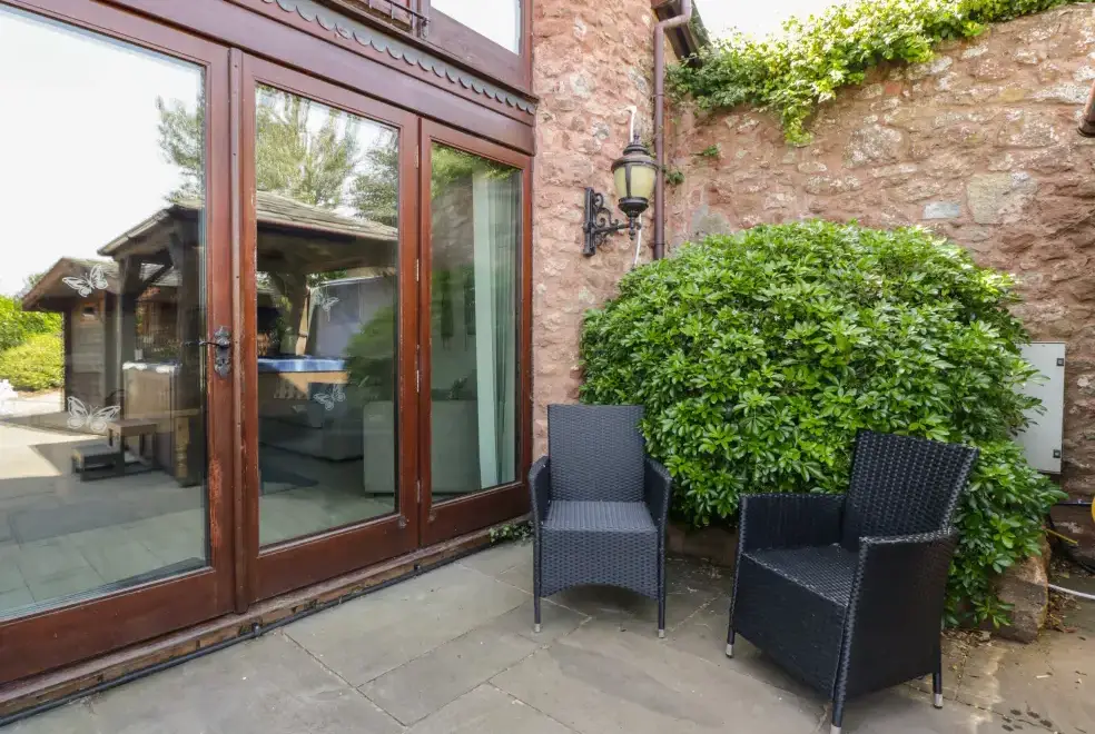 Patio area at Linhay Barn Conversion