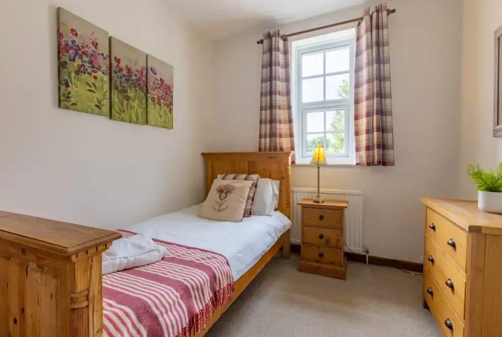 Bedroom at Lower Northcott  Farmhouse