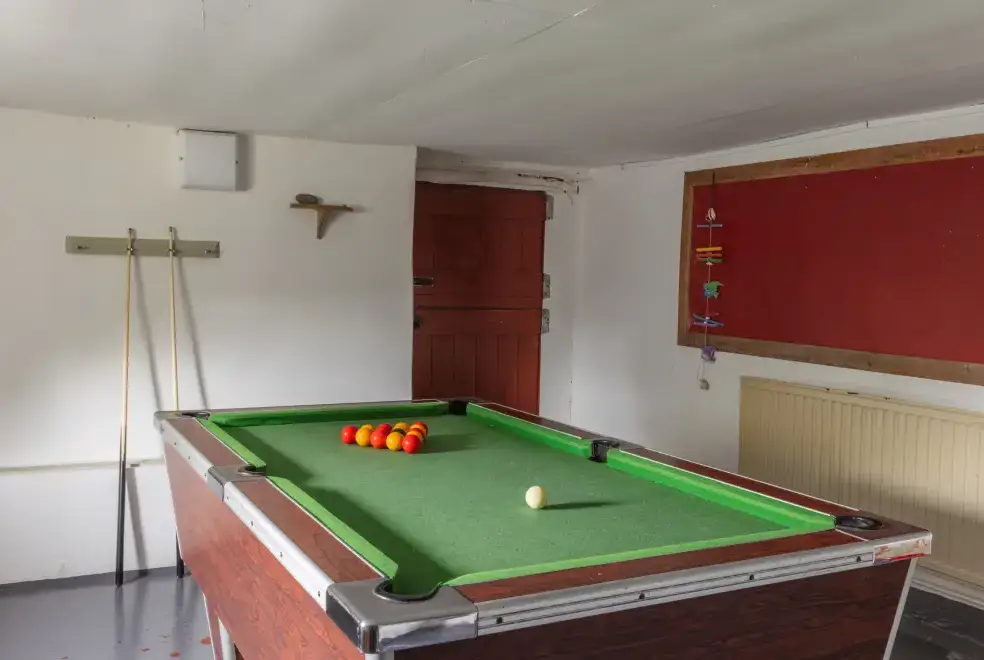 Games Room at Lower Northcott  Farmhouse
