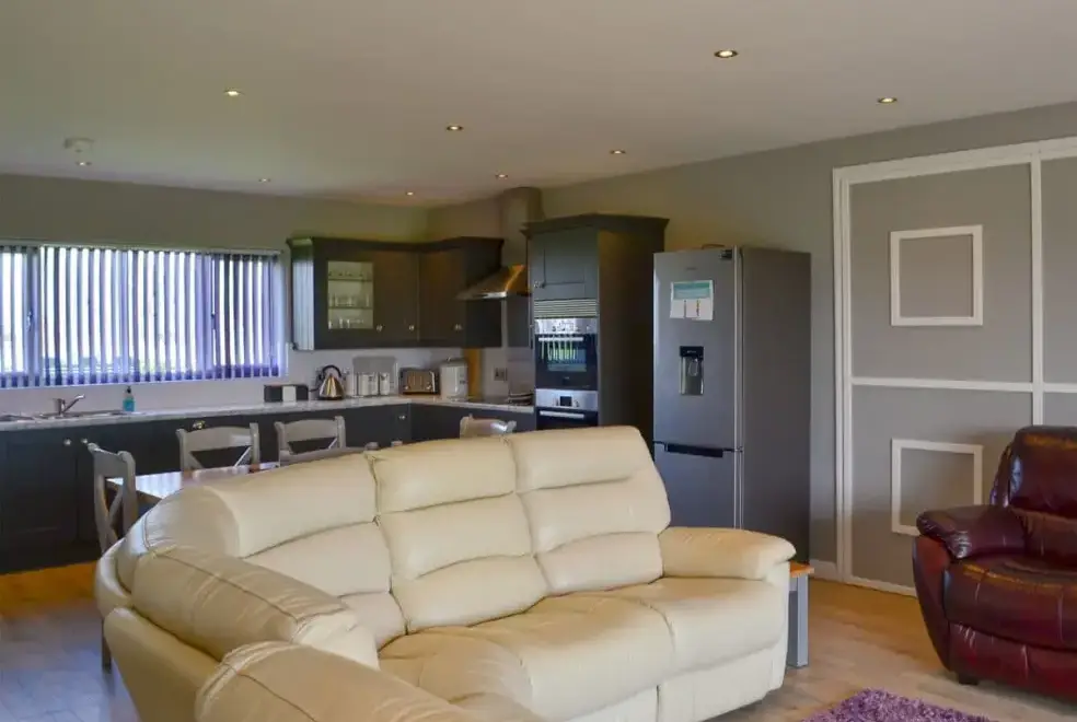 Open plan living area at Lucy's Lodge