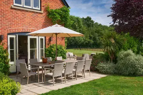 Patio area at Luxury House, 5* Gold rated,sleeps 10+1 with a large garden, downstairs bedroom and wet room,  and a shared games room, Herefordshire