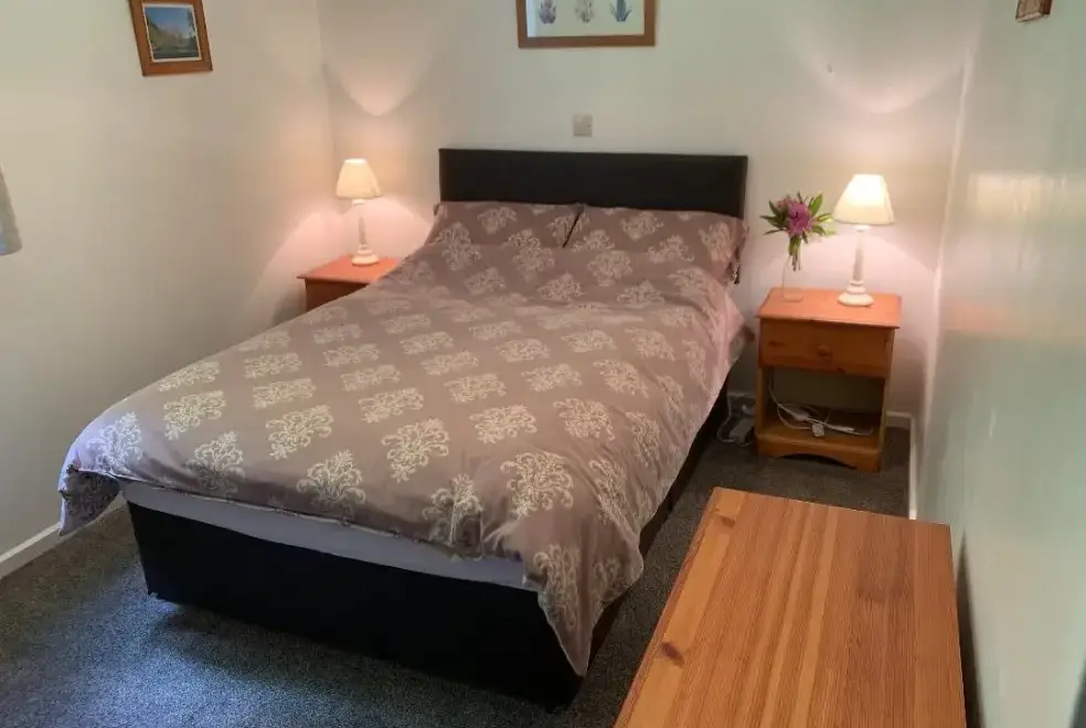 Bedroom at Malabar Chalet