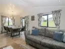 Open plan living area at Meadow Lodge - thumbnail photo