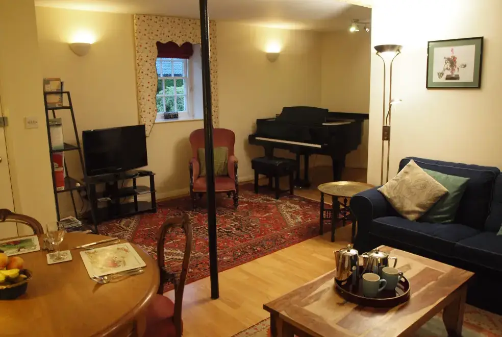 Lounge at Mendham Mill - a fabulous holiday home over a river