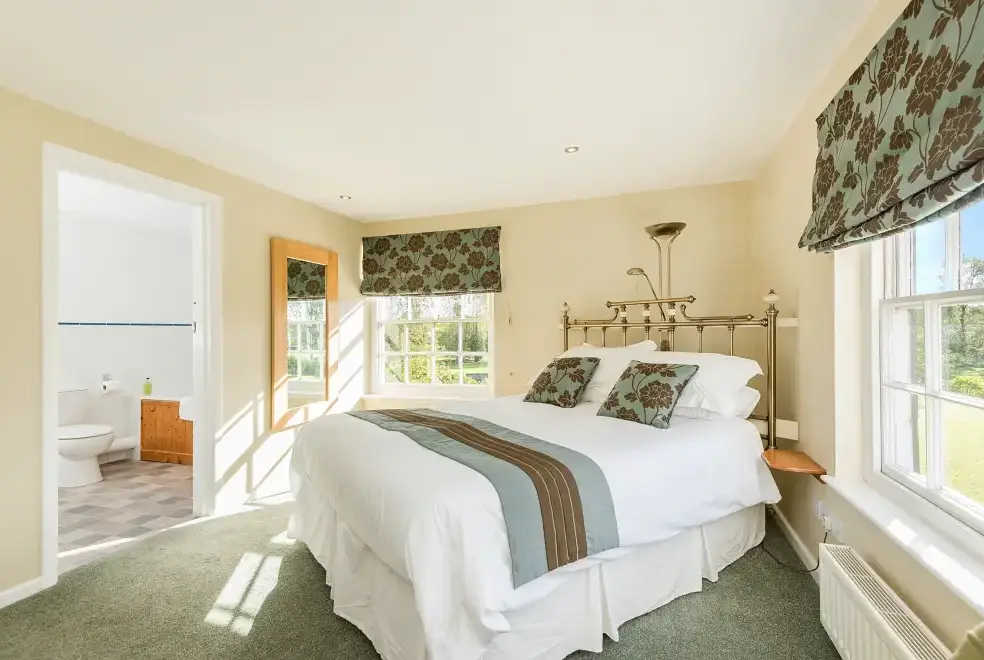 Bedroom at Mendham Mill - a fabulous holiday home over a river