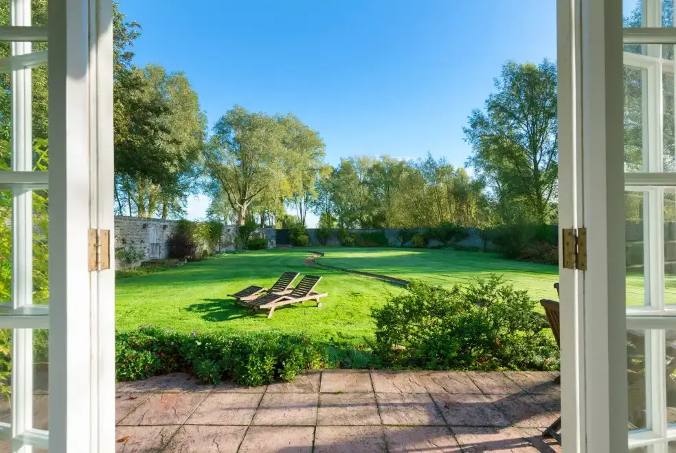 Garden at Mendham Mill - a fabulous holiday home over a river