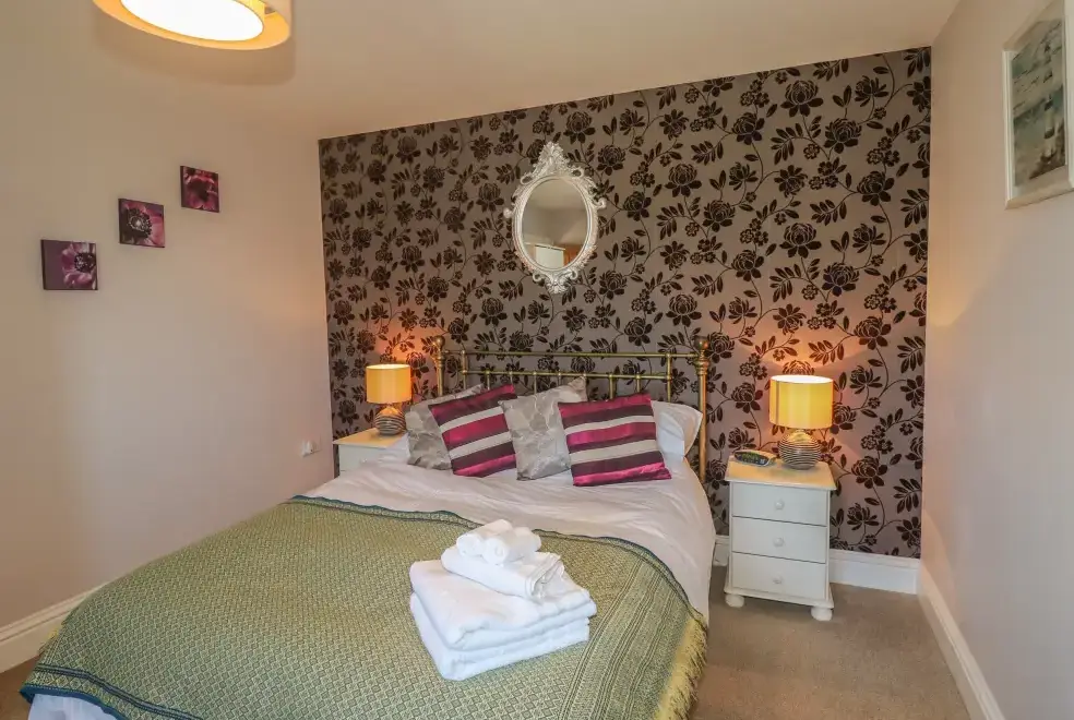 Bedroom at Middle Barn Dogs-welcome Cottage, South West England