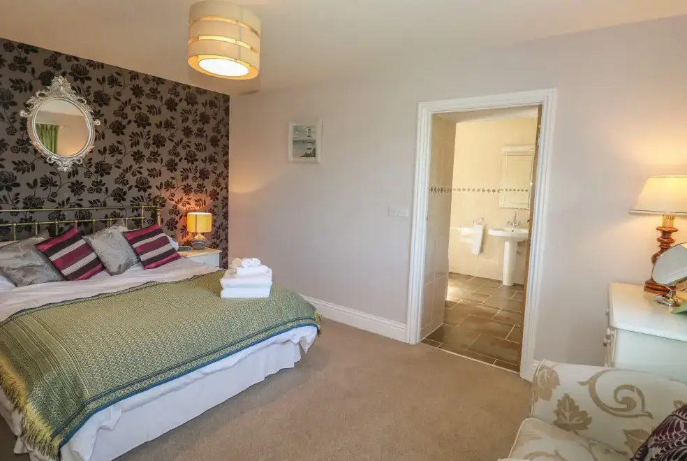 Bedroom at Middle Barn Dogs-welcome Cottage, South West England