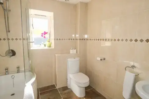 Family bathroom at Middle Barn Dogs-welcome Cottage, South West England, Cornwall