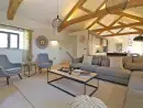 Open plan living area at Mill House, Boskensoe Barns - thumbnail photo