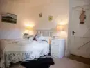Bedroom at Mr McGregors' Cottage - thumbnail photo