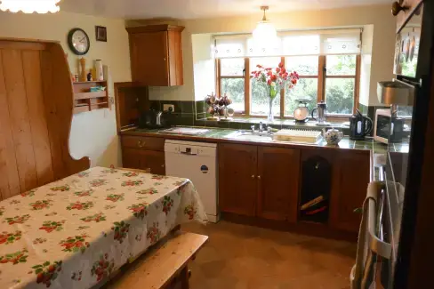 Farmhouse style kitchen at Myrtle House Old Farmhouse and Annexe, Somerset