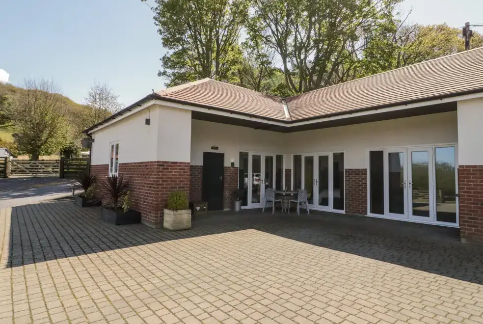 Patio area at Oakwood Rural Cottage, North Wales