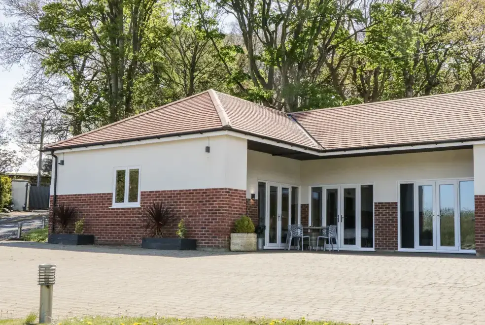 Patio area at Oakwood Rural Cottage, North Wales