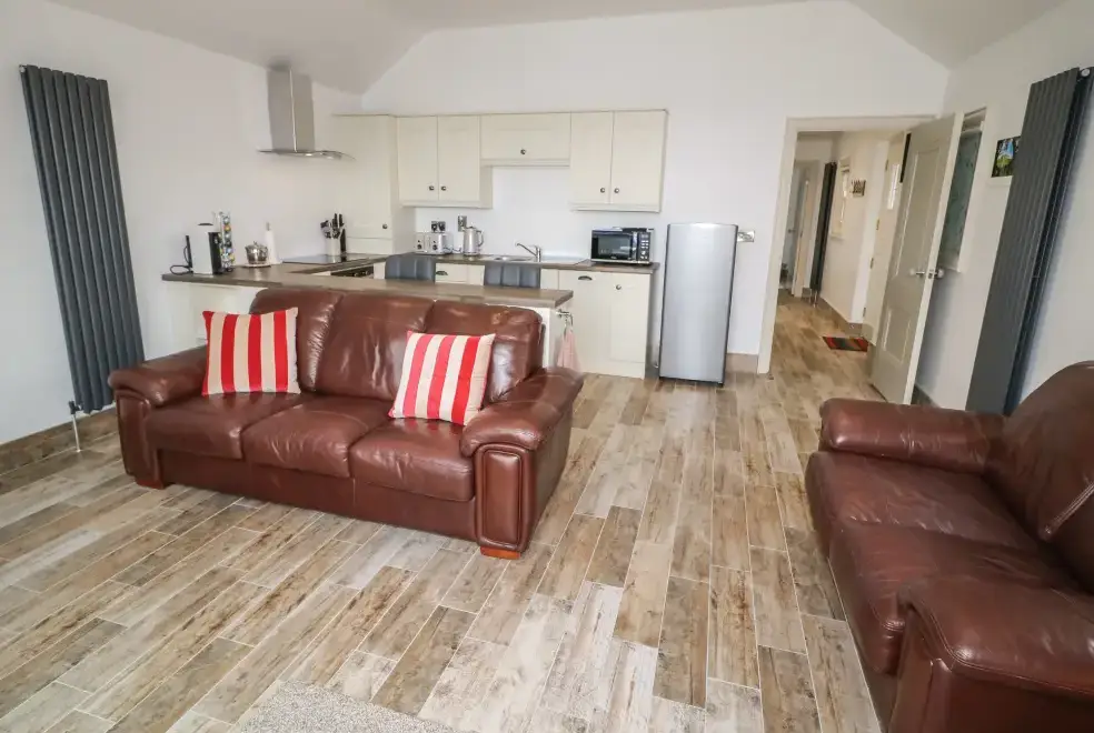Open plan living area at Old Shop Cottage