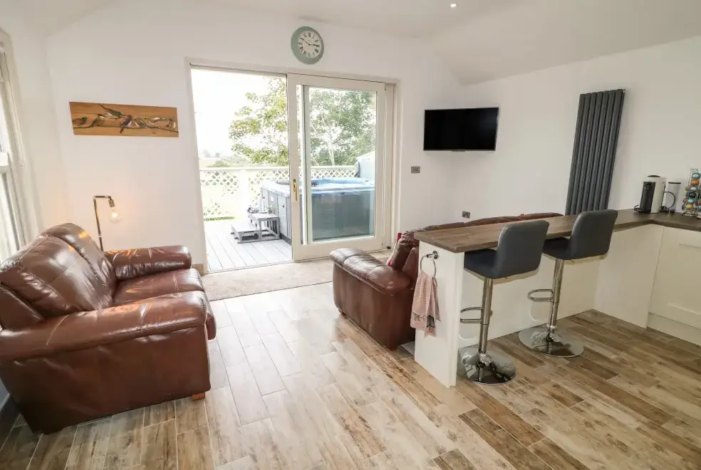 Open plan living area at Old Shop Cottage