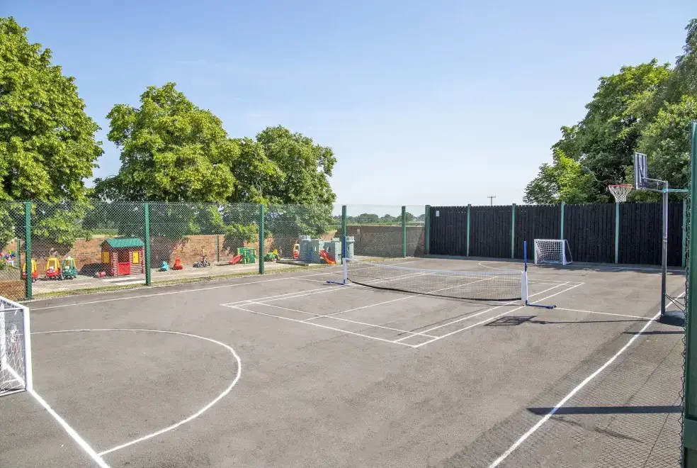 Outdoor games area at Oliver's Mill with shared Indoor Pool, Sports Court & Play Area