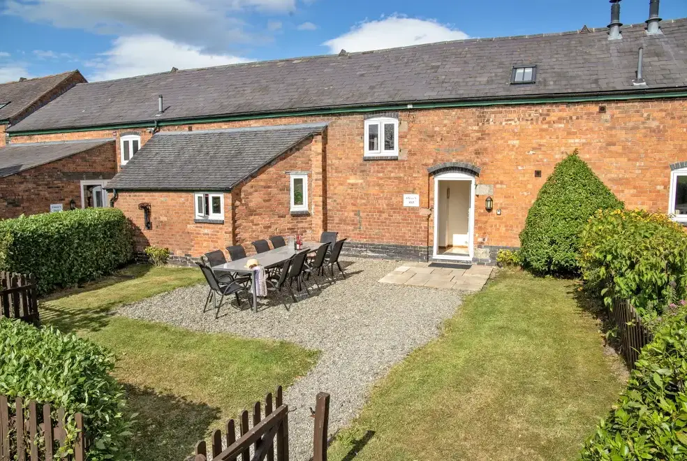 Enclosed garden at Oliver's Mill with shared Indoor Pool, Sports Court & Play Area