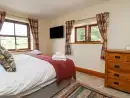 Bedroom at Orcaber Farmhouse - thumbnail photo