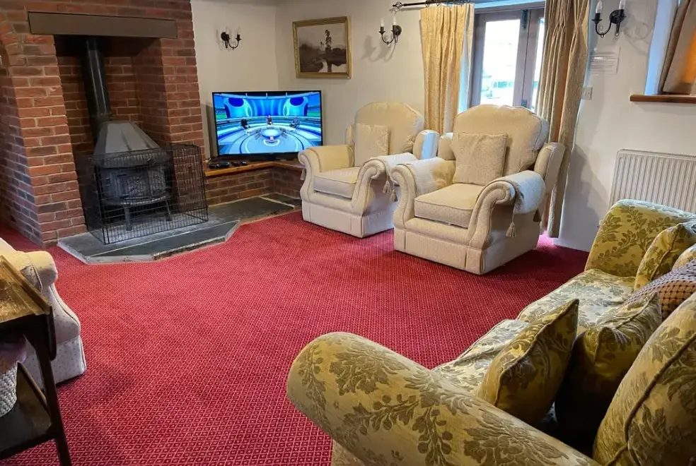 Lounge at Orchard Barn at Duvale Priory