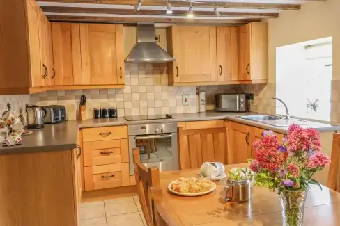 Farmhouse style kitchen at Orchard View Dogs-Welcome Cottage, Peak District National Park, Derbyshire