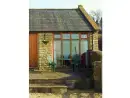 Patio area at Owl Cottage at Coombe Barn Cottages - thumbnail photo