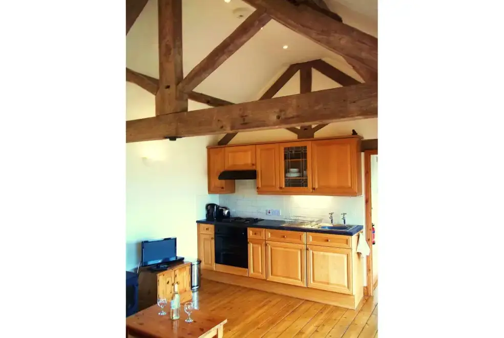 Kitchen/diner at Owl Cottage at Coombe Barn Cottages