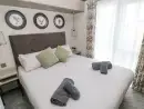 Bedroom at Oyster Lodge - thumbnail photo