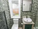 Shower room at Oyster Lodge - thumbnail photo