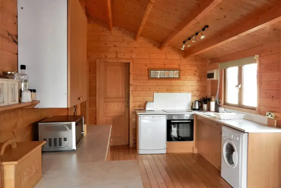 Well equipped kitchen at Pennylands Hill View Lodge