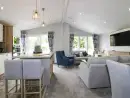 Open plan living area at Pinehurst Lodge - thumbnail photo