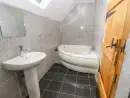 Ensuite bathroom at Rhandregynwen Hall - thumbnail photo