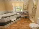Ensuite bathroom at Rhandregynwen Hall - thumbnail photo