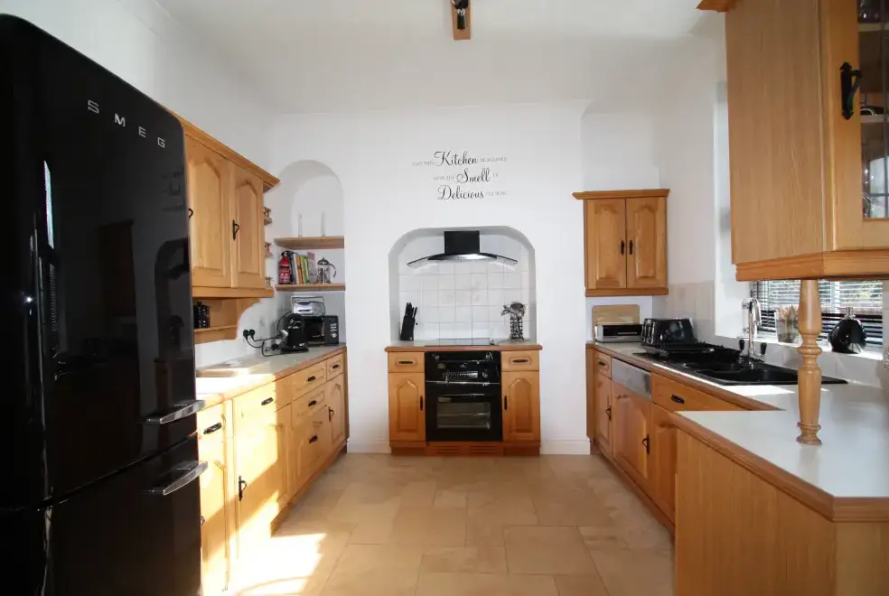 Well equipped kitchen at River Bank Cottage