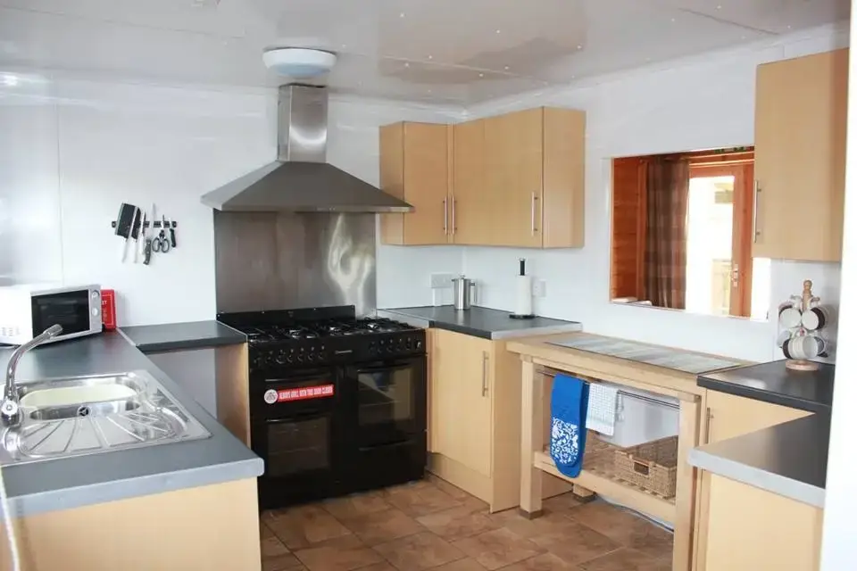 Kitchen/diner at Romantic Cabin Haf with all weather Hot Tub