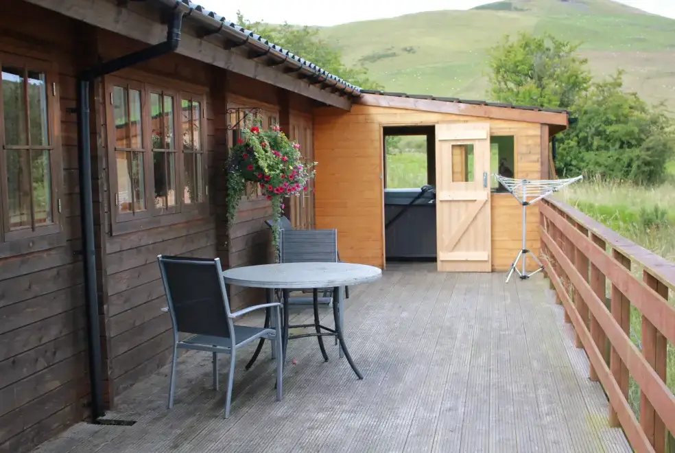 Decked area at Romantic Cabin Haf with all weather Hot Tub