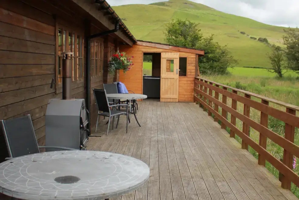 Decked area at Romantic Cabin Haf with all weather Hot Tub