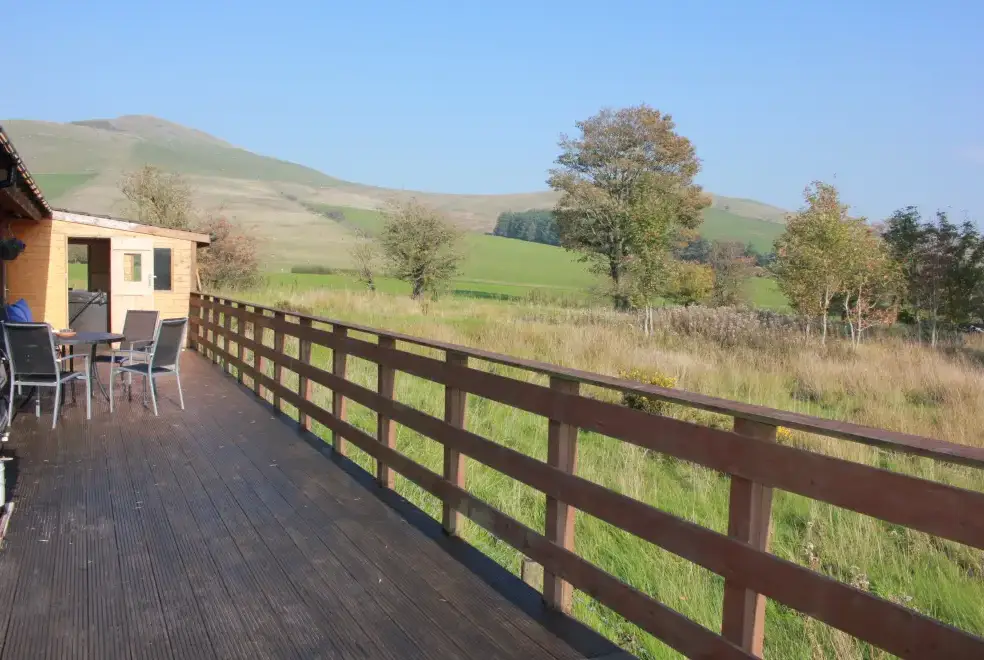 Decked area at Romantic Cabin Haf with all weather Hot Tub
