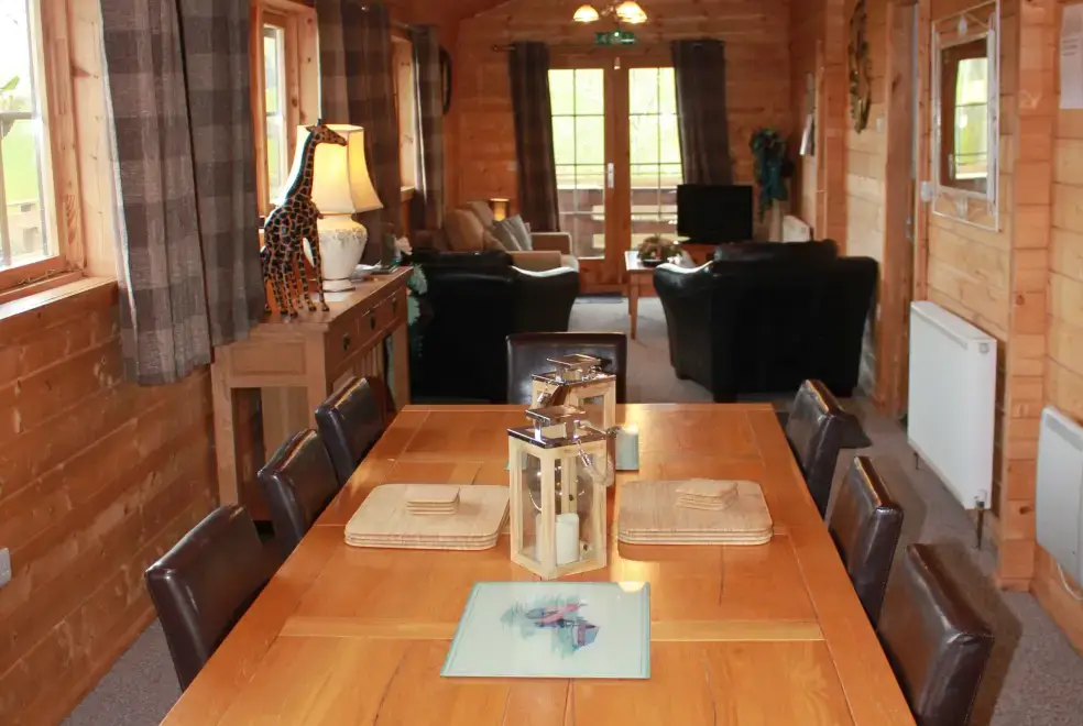 Open plan living area at Romantic Cabin Haf with all weather Hot Tub