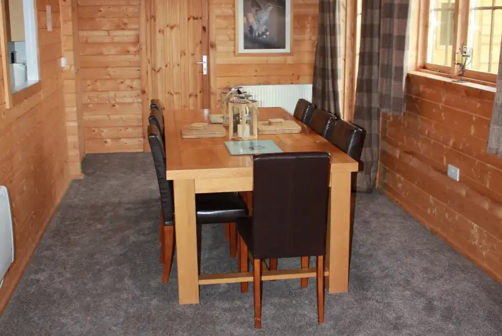 Dining room at Romantic Cabin Haf with all weather Hot Tub