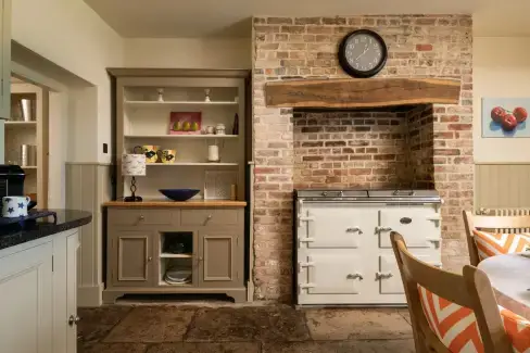 Farmhouse style kitchen at Rose Cottage, Dorset
