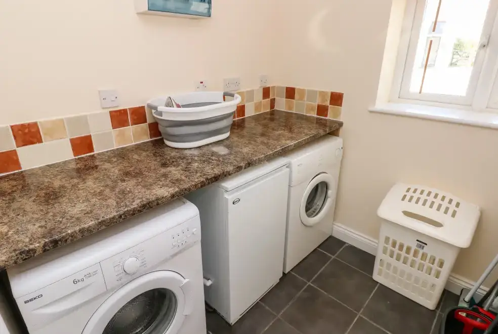 Utility room at Saddlers Cottage, Berllandeg Farm