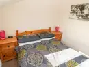 Bedroom at Saddlers Cottage, Berllandeg Farm - thumbnail photo