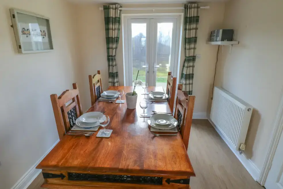 Dining room at Saddlers Cottage, Berllandeg Farm