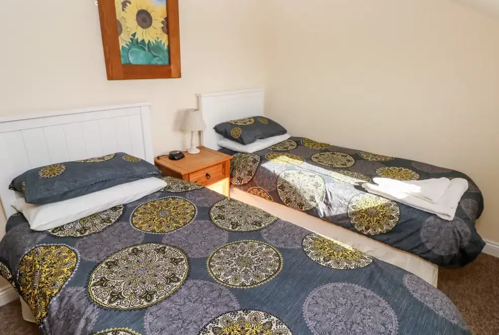Bedroom at Saddlers Cottage, Berllandeg Farm